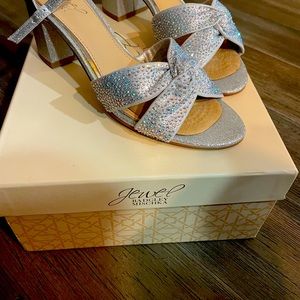 Jewel Badgley Mischka used once for wedding . Silver with Rhinestones.